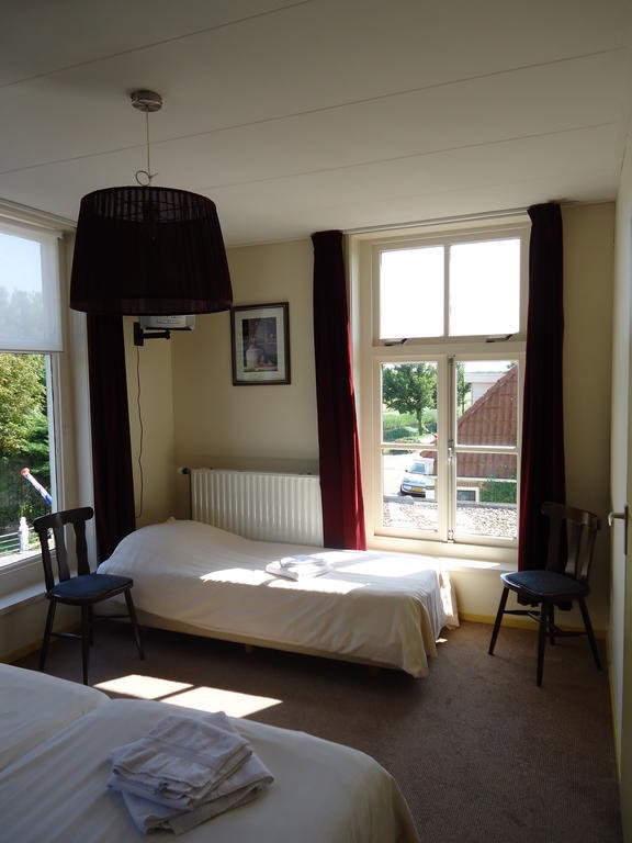 Hotel "De Steenen Man" Zurich Habitación foto